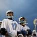 The Skyline team watches a play from the sidelines during the game against Okemos on Tuesday, April 9. AnnArbor.com I Daniel Brenner